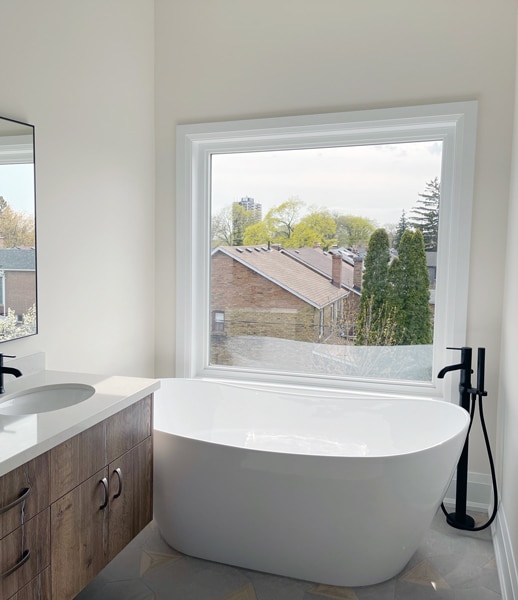 High-ROI Renovation – Spa-like bathroom with freestanding tub and heated floors by Dan Robinson Construction in Simcoe-Muskoka